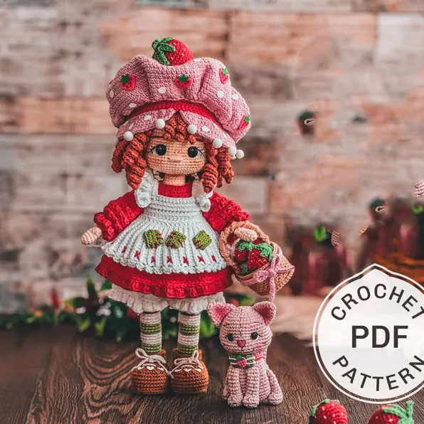 Doll dressed in strawberry costume