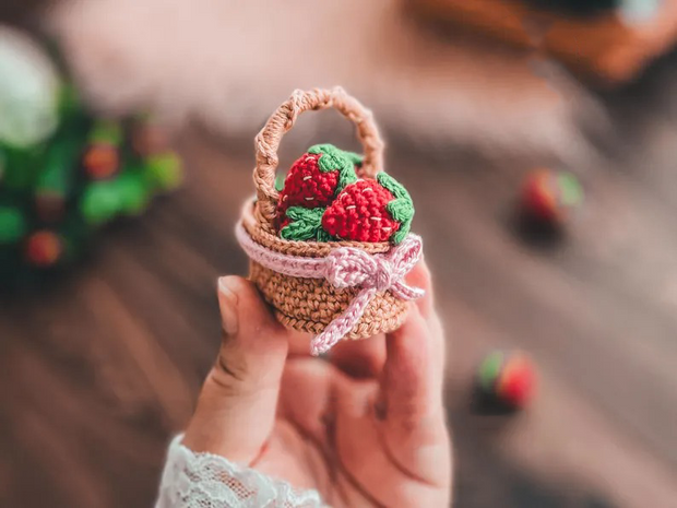 Doll dressed in strawberry costume