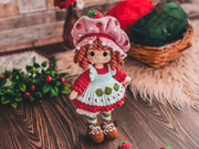 Doll dressed in strawberry costume